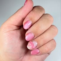 Pink nails with a bow design